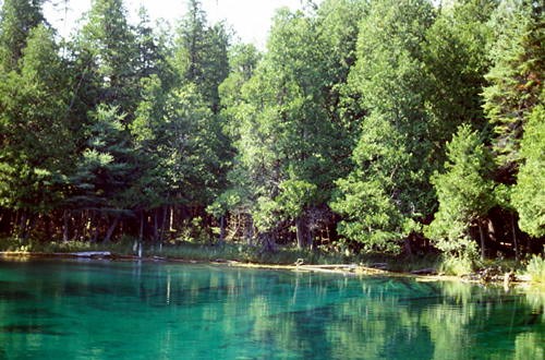The water is actually this color.  It is a 40 foot deep, spring feed pool called 