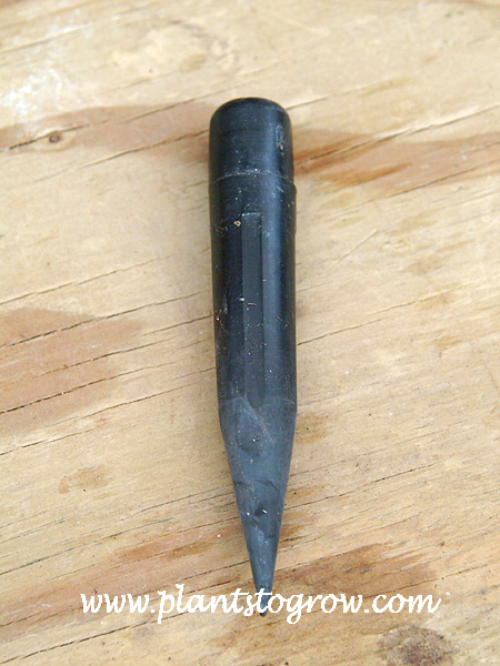 A dibble is a tool used to create planting holes for small plants.